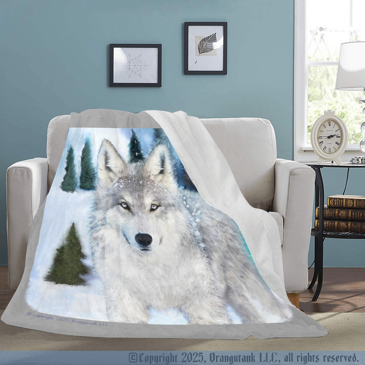 Gray wolf design blanket draped over a chair in a room with a clock and books on a table.