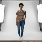 Person wearing a brown and beige coffee pattern shirt with blue jeans standing in a studio setting with lighting equipment.